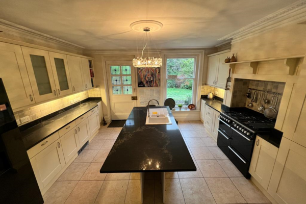 Roktops Worksurfaces LTD | Kitchens | Corian Worktops | Dark Corian Worktop Island